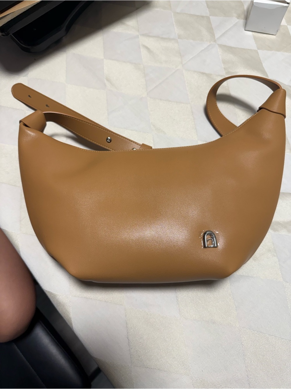 Classic Tan Crescent Shoulder Bag with Subtle Silver Accent
